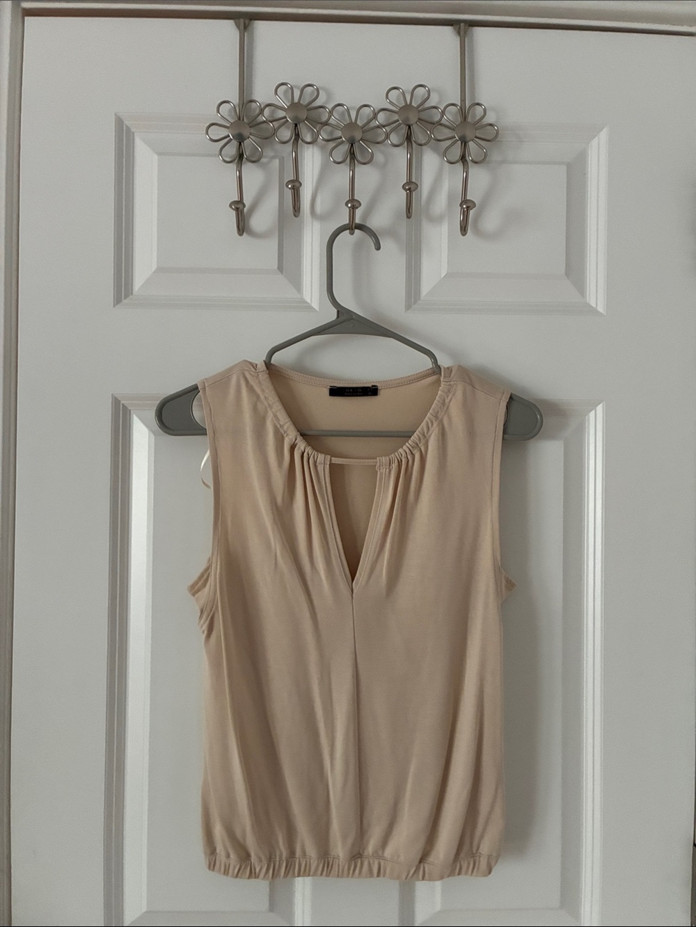 Sleeveless Cream Blouse with V-Neck